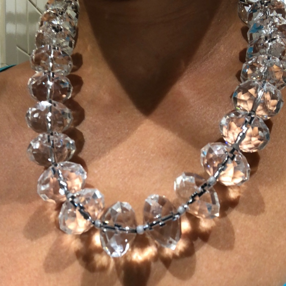 Clear-cut Bead necklace.  Black ribbon.